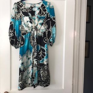 Beautiful dress never worn without tags.